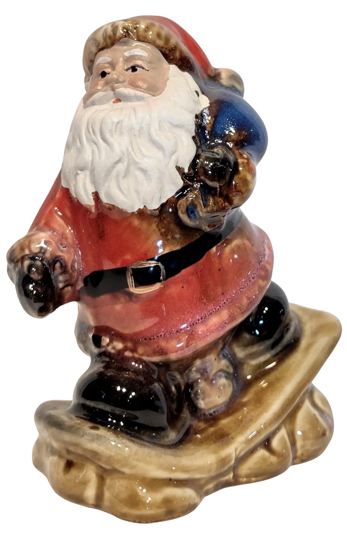 Ceramic Santa Figurine On Snowboard or Skis